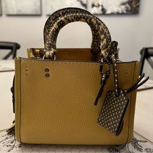Coach Rogue 17 in Sunflower with Snakeskin details